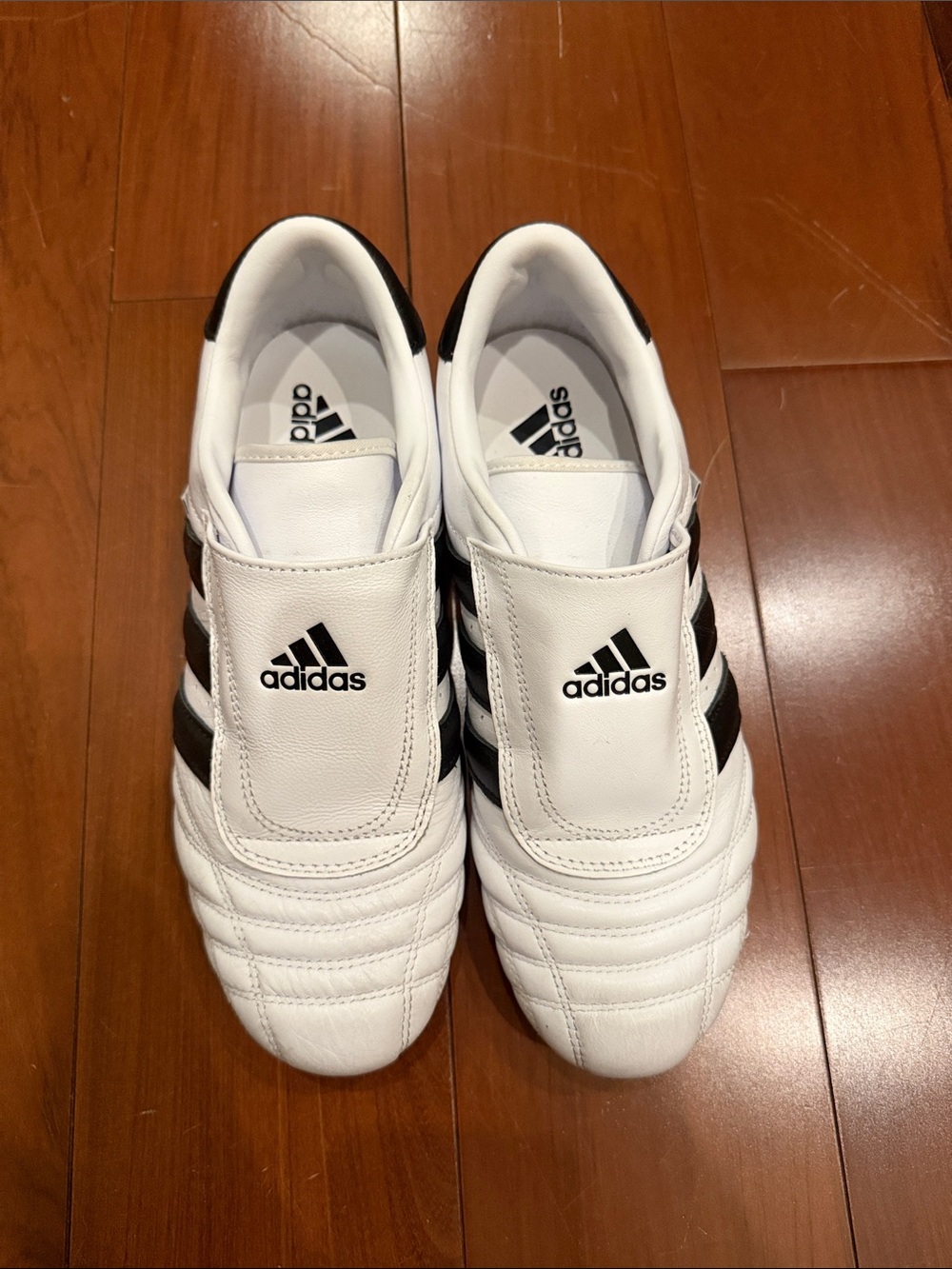 adidas White and Black Women's Slip-On Athletic Shoes with Three Stripes